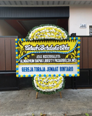 Papan Bunga Duka di Langowan Barat